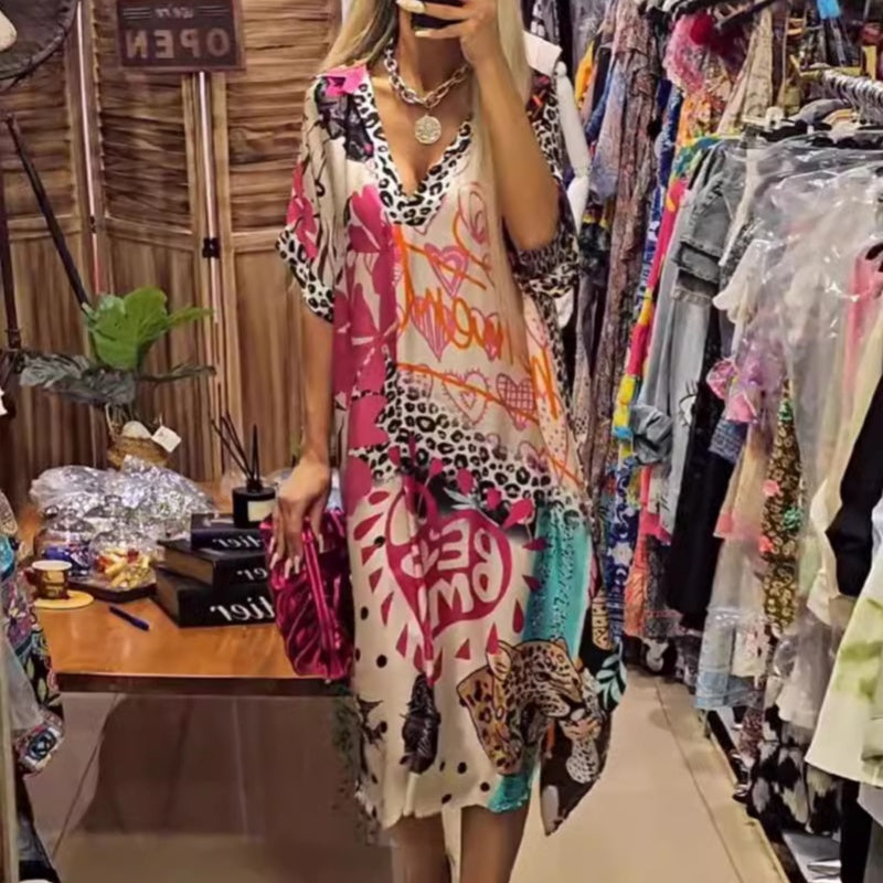 š2025 New Products Hot SaleāØWomenās Deep V-Neck Short Sleeve Printed Dress