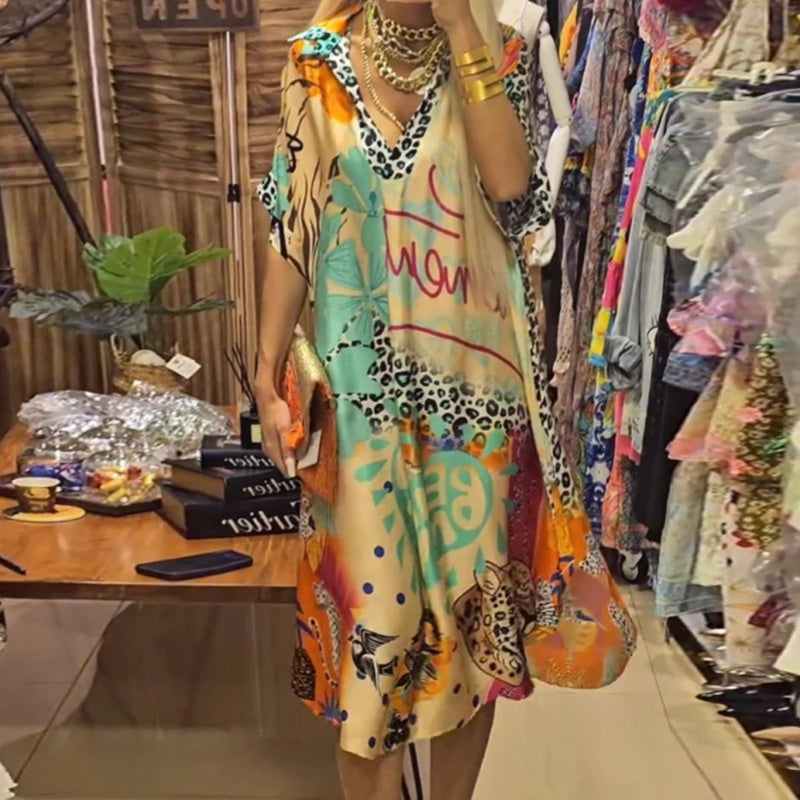 š2025 New Products Hot SaleāØWomenās Deep V-Neck Short Sleeve Printed Dress