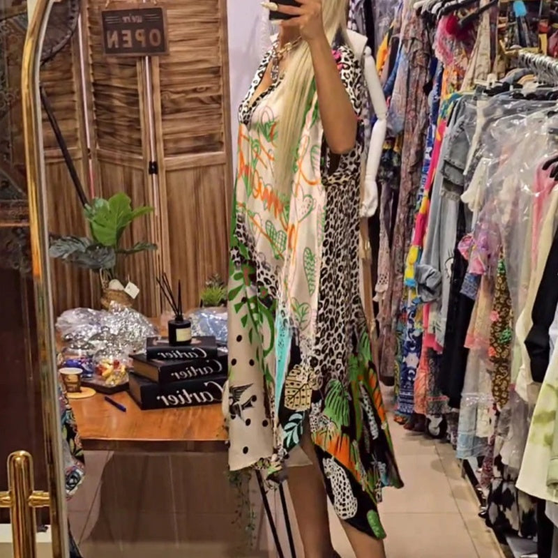 š2025 New Products Hot SaleāØWomenās Deep V-Neck Short Sleeve Printed Dress