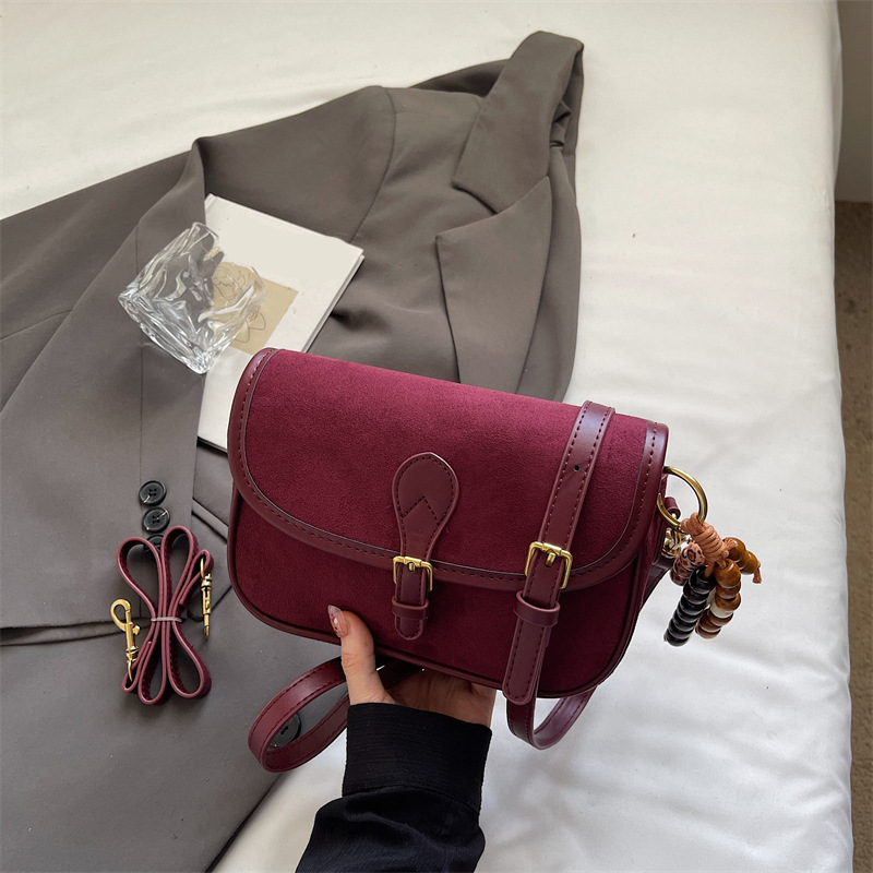 Women’s Saddle Crossbody Bag with Charm