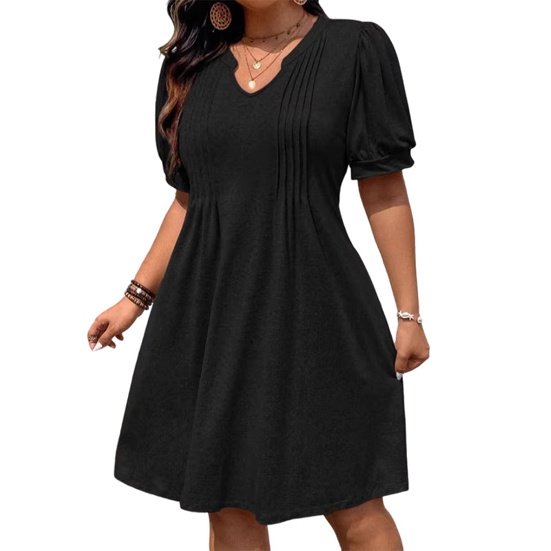 Elegant Style That Flatters Every Curve ✨A timeless A-line dress designed with a graceful V-neck, soft puff sleeves, and a flattering silhouette that makes you feel confident for any occasion.